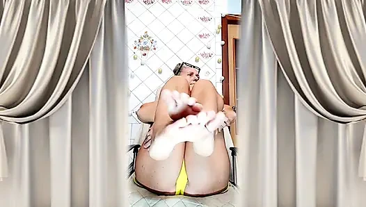 Cheerful Housewife Lukerya Shows Her Bare Feet in Kitchen. Mature Soles and Toes Close Up