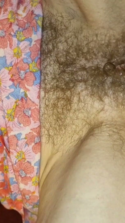 He fucks her with his whole hand while she watches porn. Her pussy is wet and stretched. | Clip 1