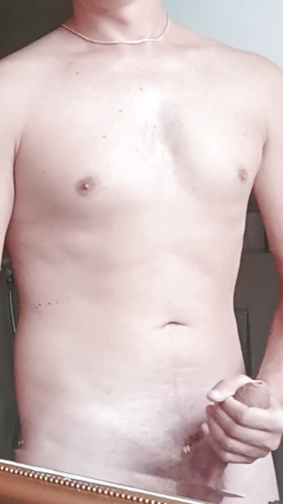 Young stud secretly stroking his big cock