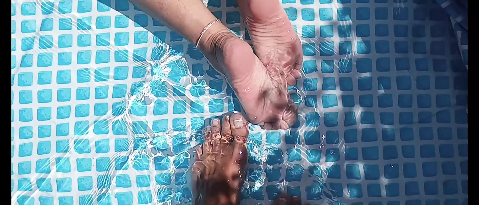 Cleaning the pool while barefoot