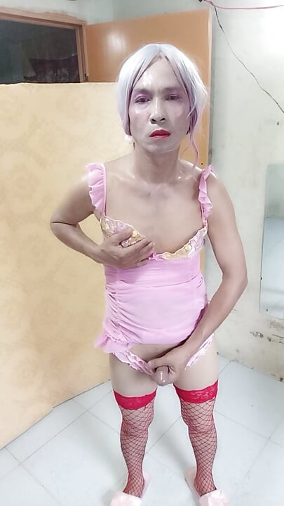 Oanh Le transgender wearing sexy and pornographic clothes standing and screaming is extremely happy