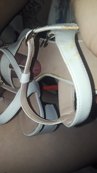playing with her sandals