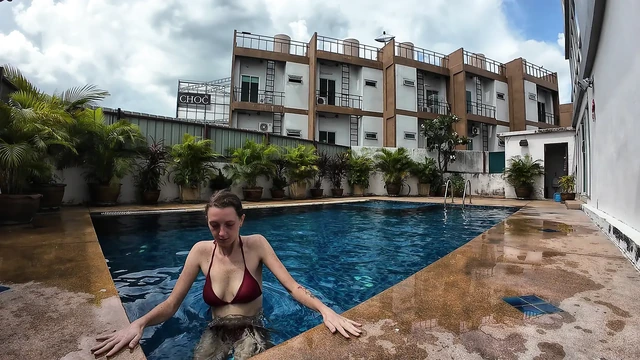 watch us playing in our swimming pool