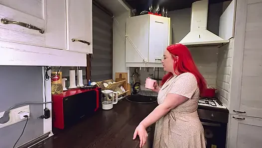 Sex in the kitchen with a red-haired wife. .