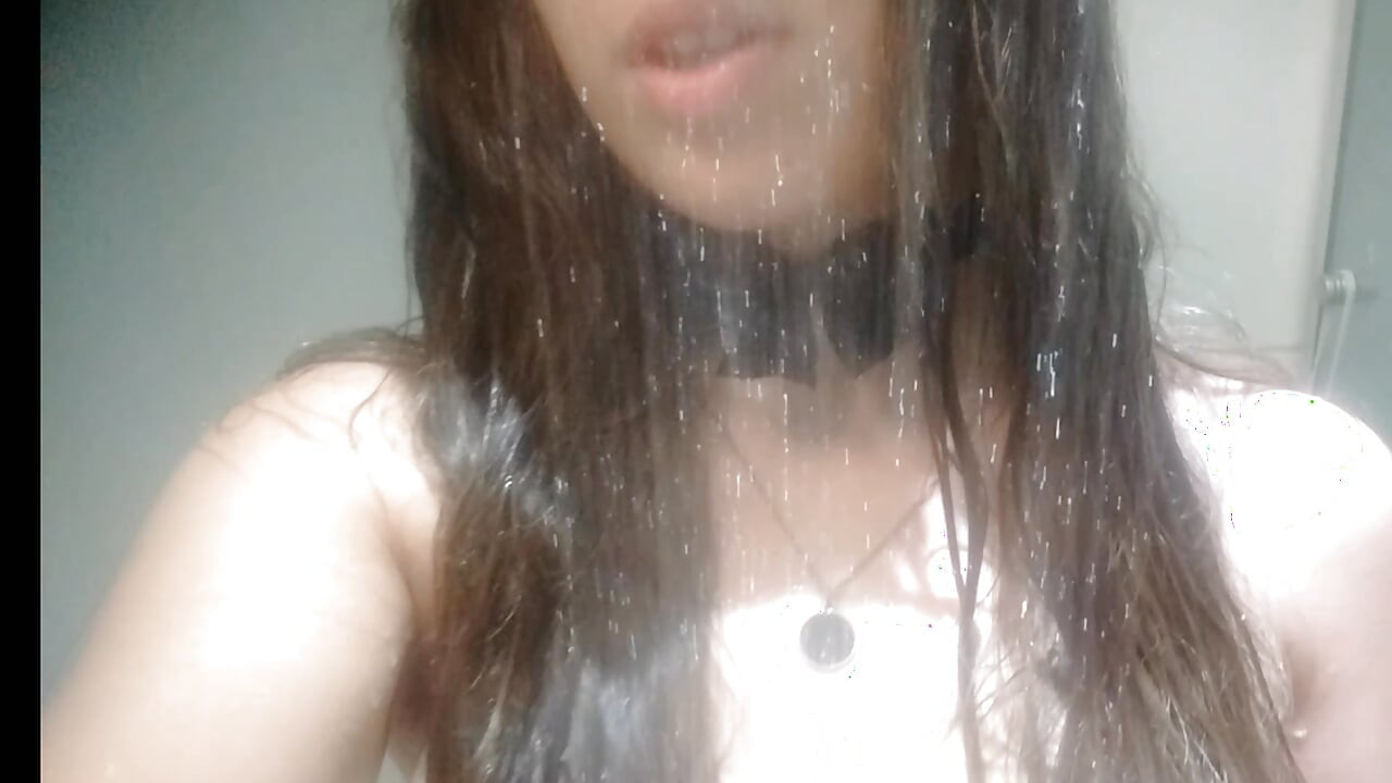 Hot teen taking shower wearing a white lingerie