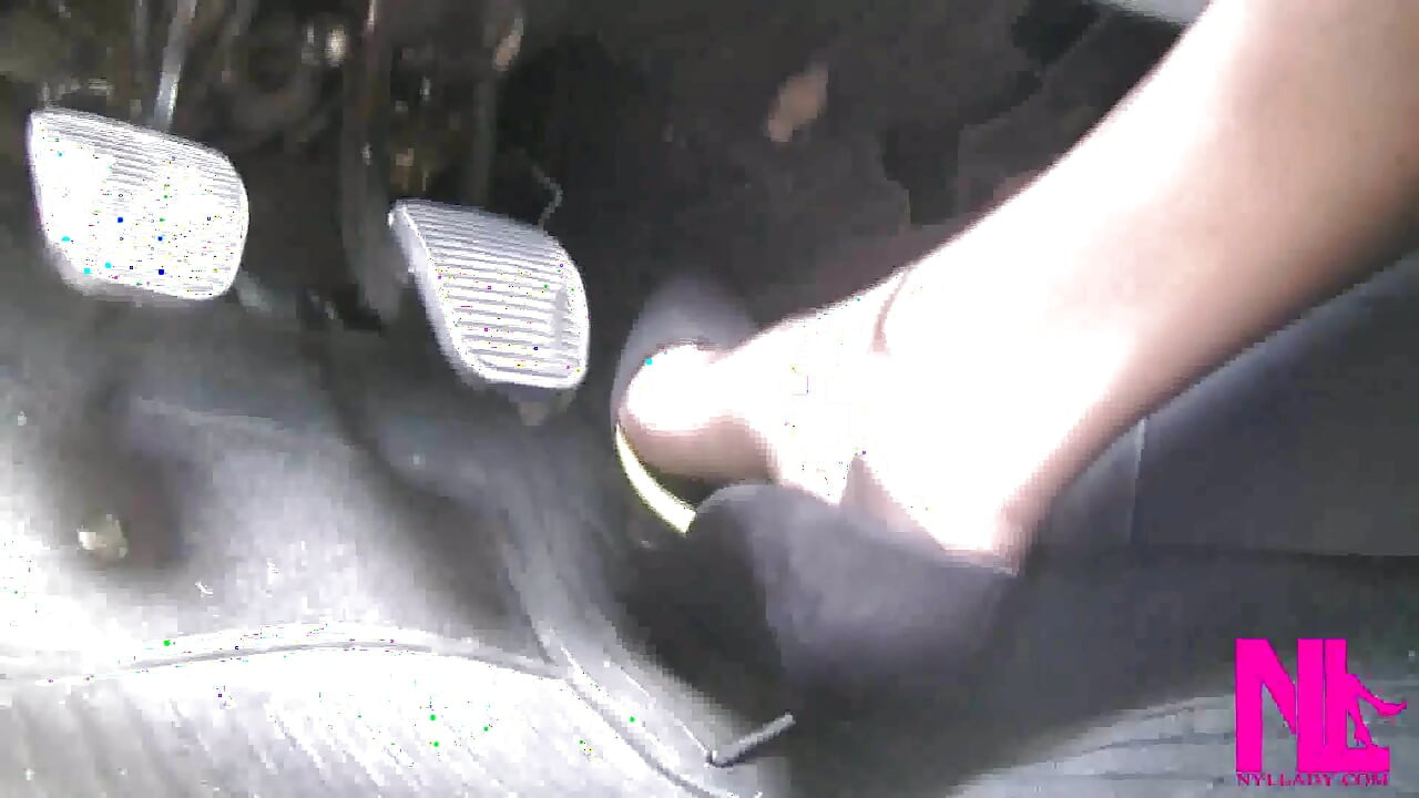 Sensual Driving in Black Suede Pumps with Thin Metal High Heels