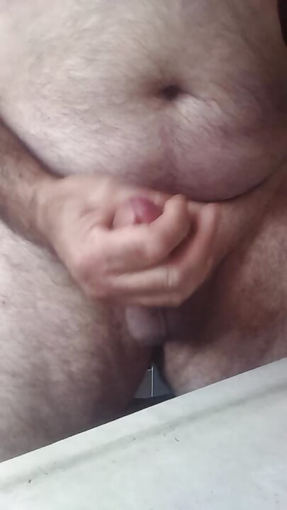 Handsome Mature Chubby with Big Fat Cock Masturbating with His Very Hard Cock Until He Cums a Lot
