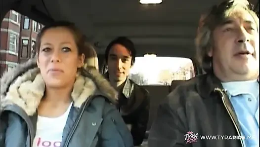 Brunette with Tattoos Gives Blowjob in Car Backseat