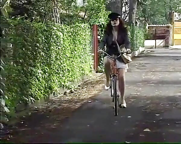 Jessica Rizzo in two scenes as a nymphomaniac postwoman