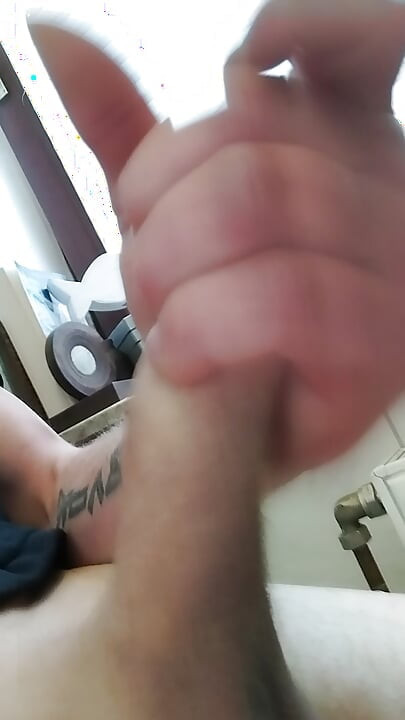 Young uncircumcised gardener jerks off at work