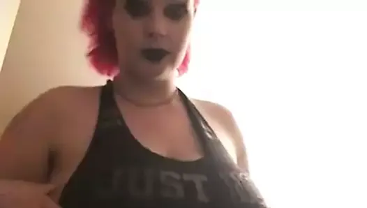 Goth girl plays with her tits and pussy