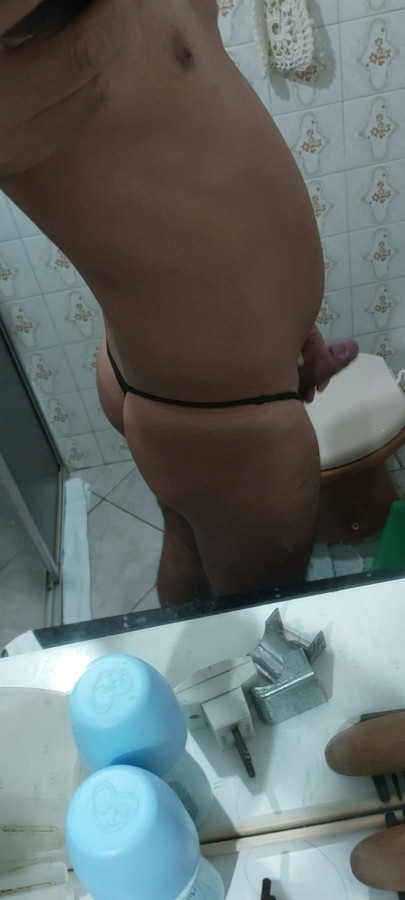 Ladysilva masturbating in the mirror showing off her hot ass