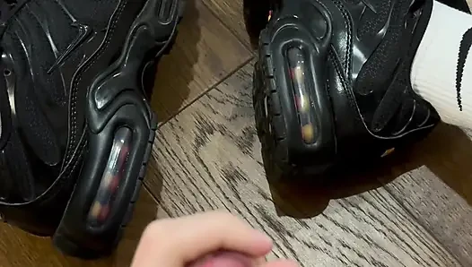 Guy jerks in socks and cums on sneakers