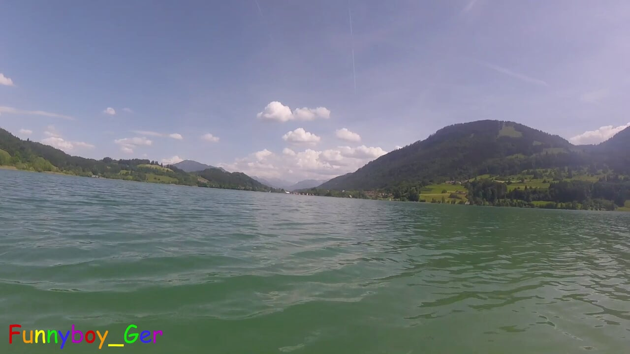 Jerking off underwater and pumping cum into the water in a stunning mountain lake.