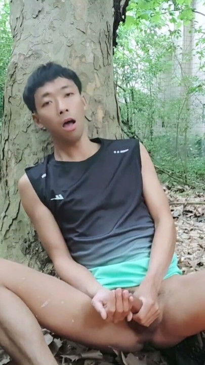 A mischievous Asian boy masturbates, moaning and ejaculating in the atrium garden of an abandoned hotel | Clip 2