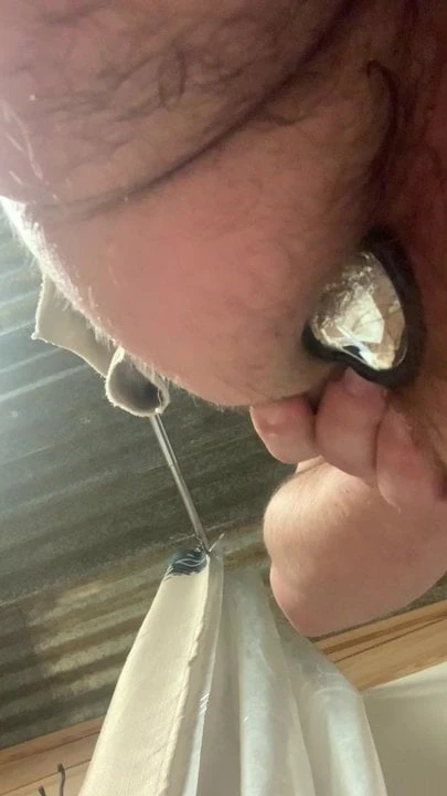 Straight guy plays with round butt plug