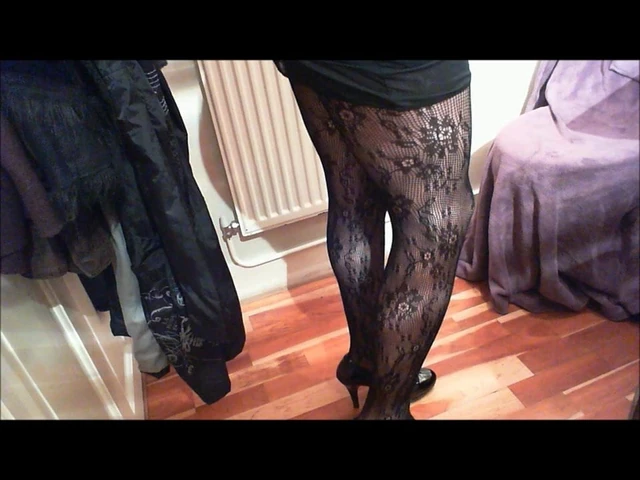 Laura teasing and cumming in a lace bodystocking