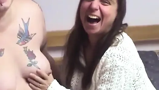 Chunky tattooed chick sits her pussy onto midget girl's face in her bedroom
