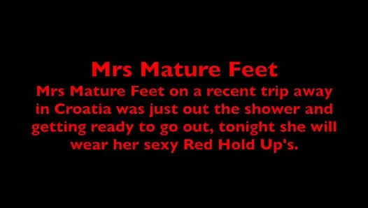 Mrs Mature Feet putting on her Red Sexy Hold Up's 405