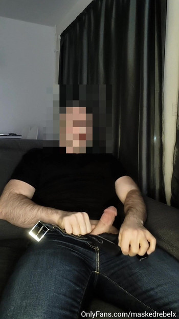 Horny man takes off his pants and starts masturbating his big cock