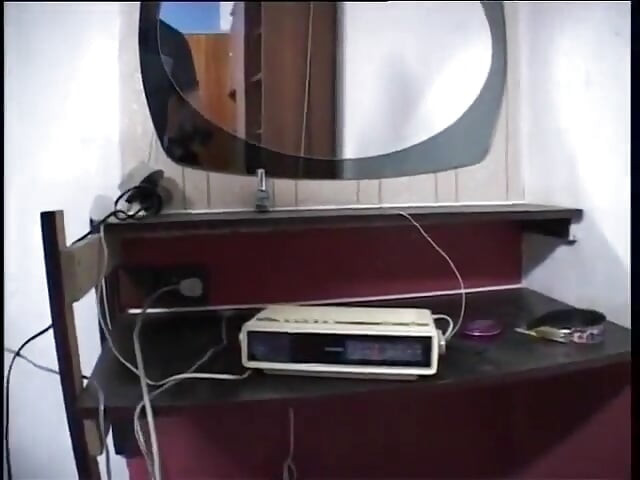 Brunette teen wearing high heels and stockings masturbating solo