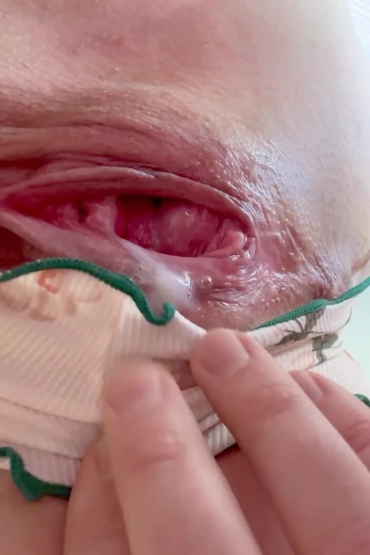 Gaping pussy after sex. Drops of sperm