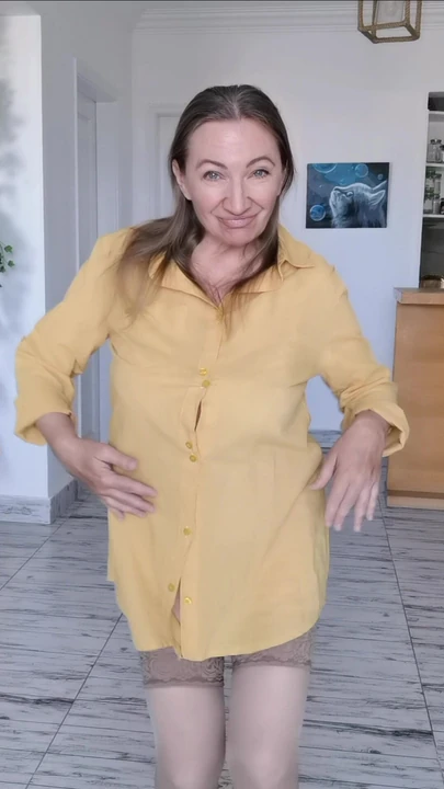 Busty granny teasing in the stockings