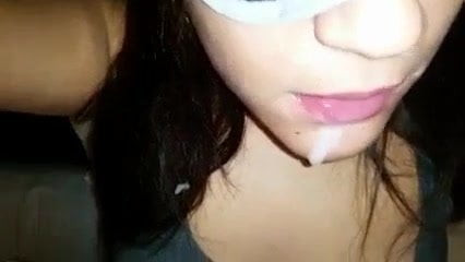 blindfolded brunette wife receives a facial