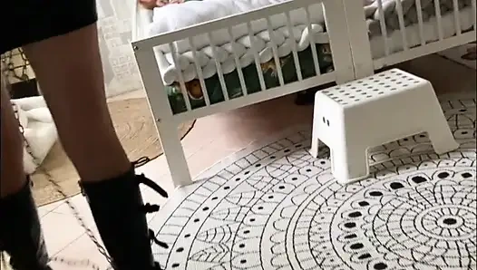 Latex maid service in high heels and chains