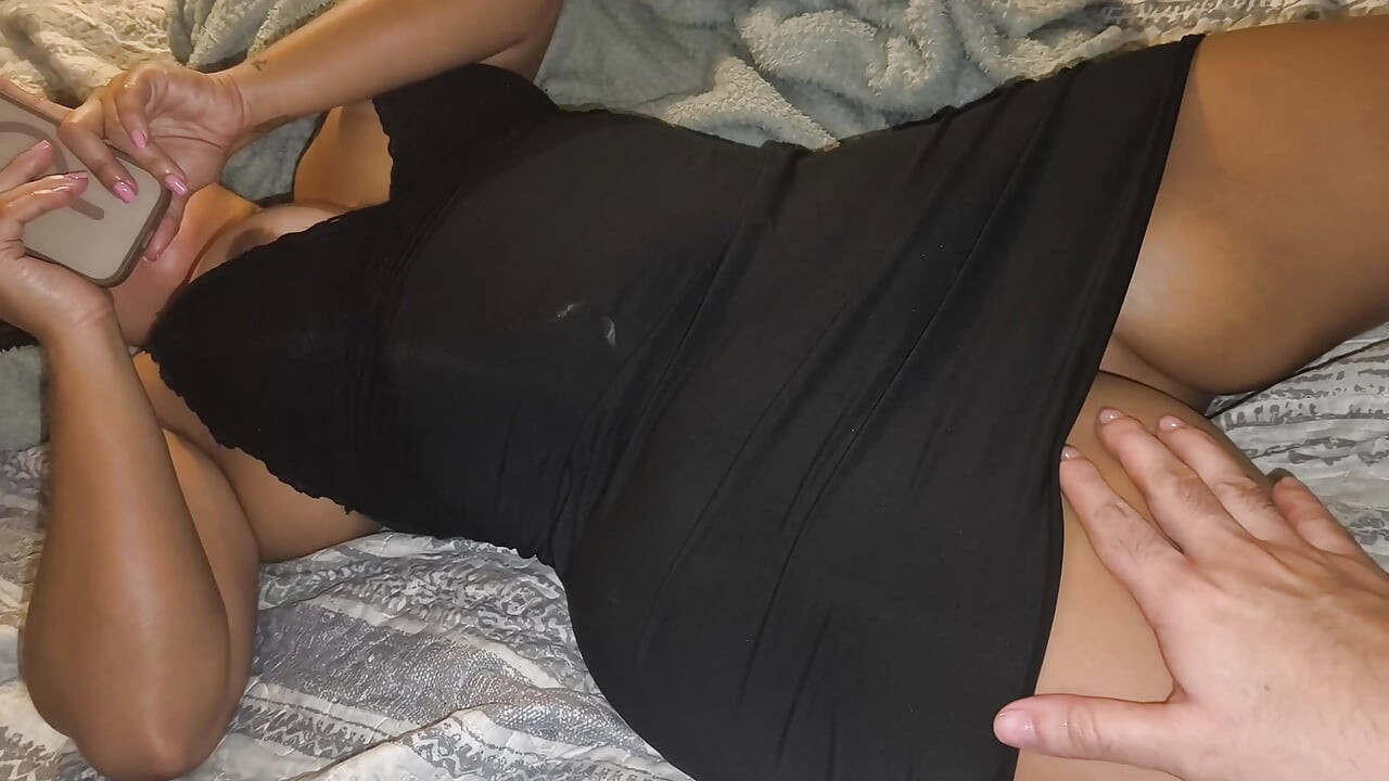 Stepmom chats with her ex while she gets penetrated