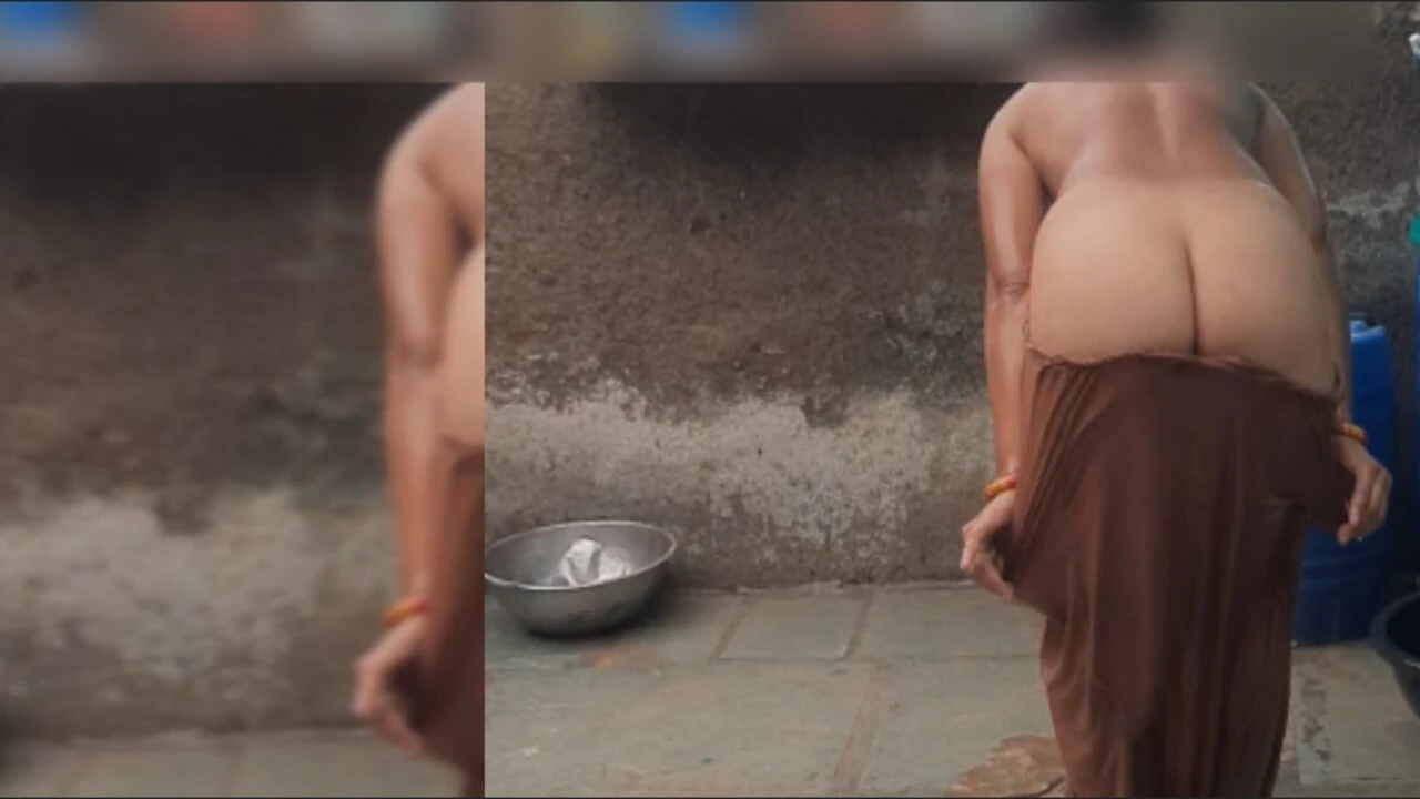 The elder sister-in-law is watching the brother-in-law in the open bathroom after going home naked after walking in the open for