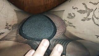 Rubbing my huge swollen in black pantyhose with the pattern