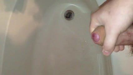 Jerking and Shooting Load into Tub