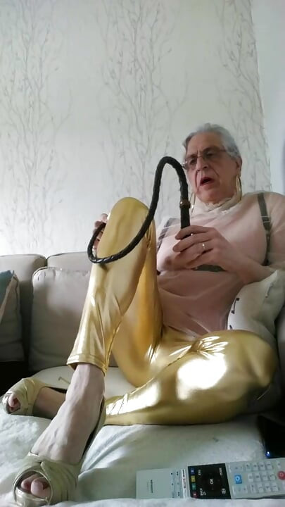 Whore in Leggings with a Whip