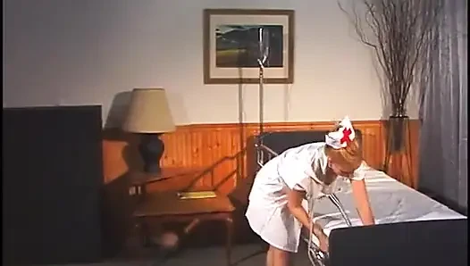 Randy doctor gets to fuck a lusty blonde nurse on a hospital bed
