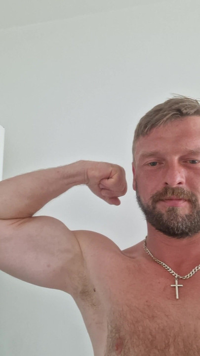 Blond, blue eyes, good body, tanned, willing to have a threesome with a woman