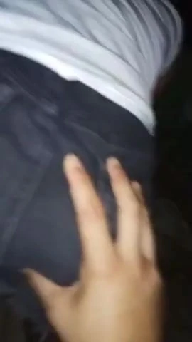 A young couple is getting horny in  public