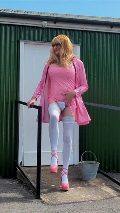 Emotional moment from "Tranny Gina In Pink PVC Dress Masturbating, Cumming"