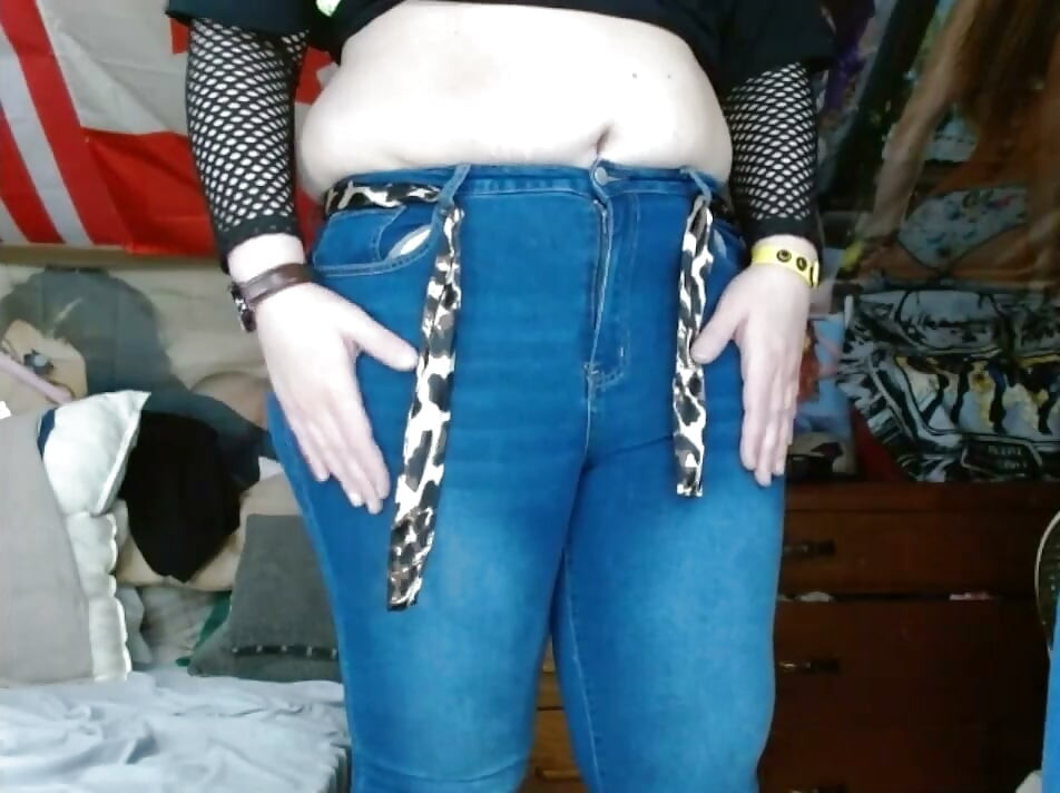 fat sissy with tits wearing and stripping out them tight jeans
