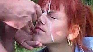 Outdoor gooey facial on red haired cock sucker