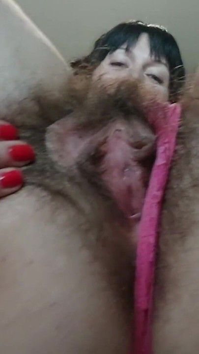 Unforgettable moment from "a hairy pussy has found a comfortable position for you to sniff and lick it. large labia protrude from a fluffy bush"