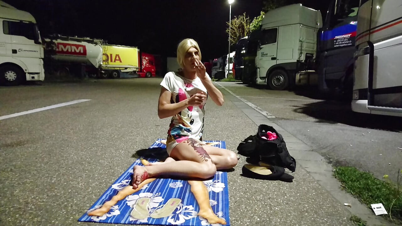 Undressing and masturbating at the truck seat
