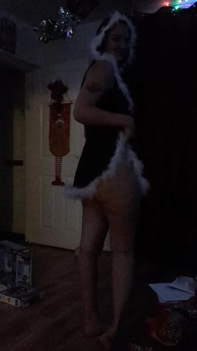 Miss santa cumming down from upstairs looking for Santa's sa