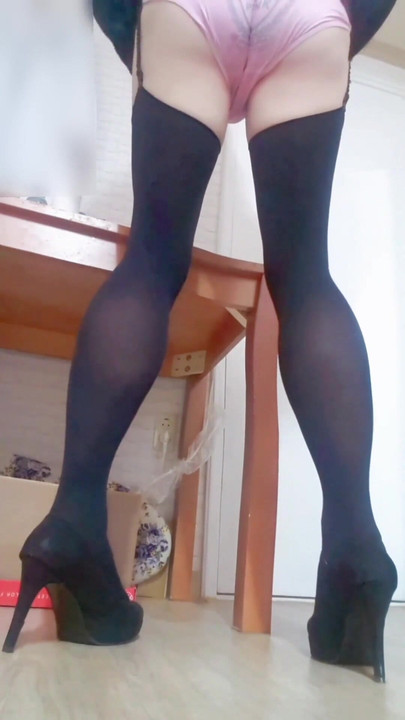Unforgettable moment from "Young asian sissy in black garterbelt stockings and highheels gives herself an enema and shaves"