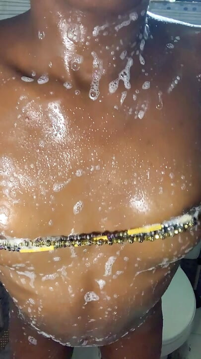 Hot ebony babe bathroom section shaking boobs and ass to the camera