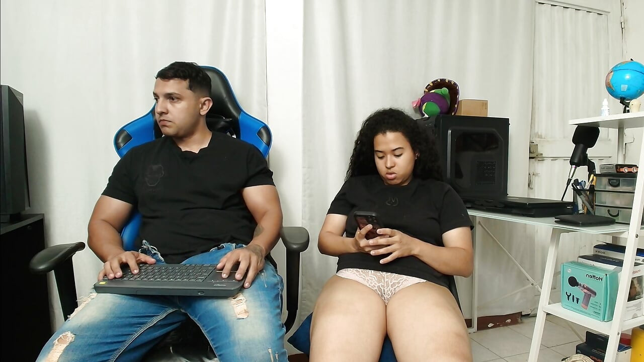 The whore masturbates in the office
