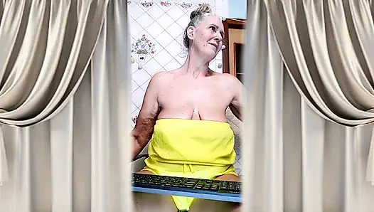 Cheerful Housewife Lukerya Shows Her Bare Feet in Kitchen. Mature Soles and Toes Close Up