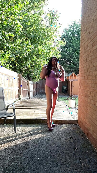 Sexy Crossdresser Kellycd2022 in purple sexy bodysuit and heels