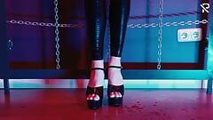 Slave Girl in Latex Catsuit in Electro-shock-heels