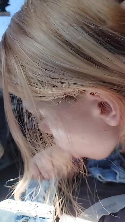 Pretty teen gives a hot POV blowjob in the car!